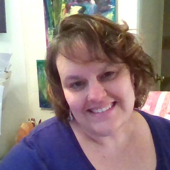 Image of a smiling Rebecca Teeter; Vitality Alignment Coach.